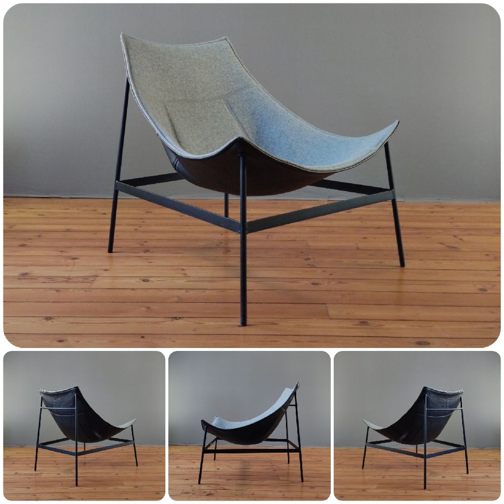 Chauffeuse / Fauteuil Design avec une ossature en métal noire surmonté d'une assise suspendu en cuir noire et tissus gris Design modèle Montparnasse du designer Français Christophe PILLET pour OFFECCT,